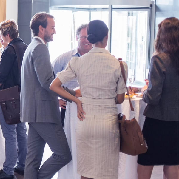 People talk at a WID Greater Los Angeles Event