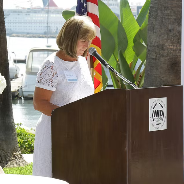 A member of WID Greater Los Angeles speaks at an event
